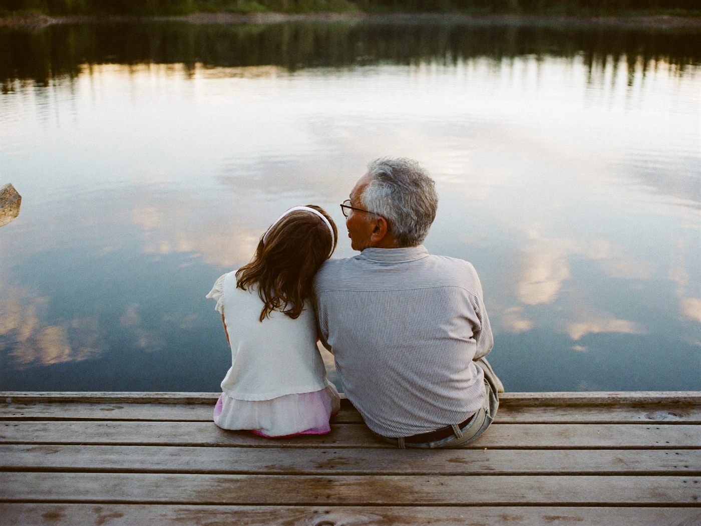 A grandfather and granddaughter by Sylvan Lake